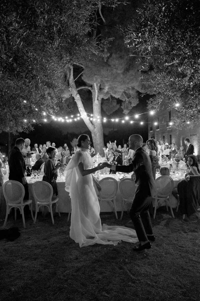 Bree and Jaime's first dance under the tree and the string lights at Finca Morneta, Mallorca