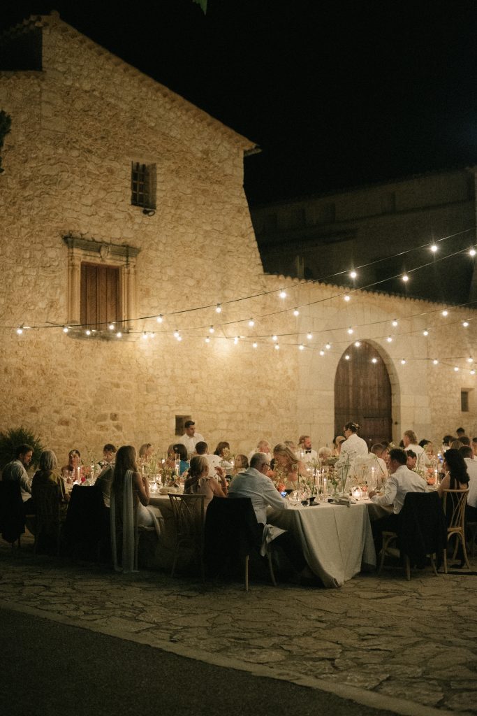 Evening dinner in the stone courtyard at Son Berga