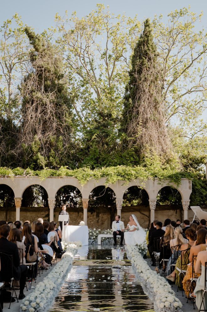 Maria and Joost's ceremony beside the reflecting pool of the cloister at Mas d'Alzedo, Valencia