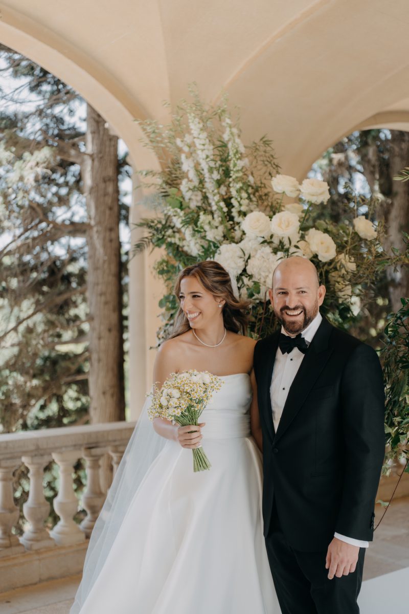 Celine and Martin under the white arcade at Mas Solers, near Barcelona